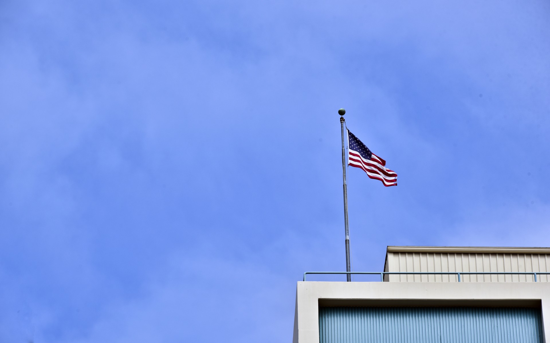 american flag flying free photo