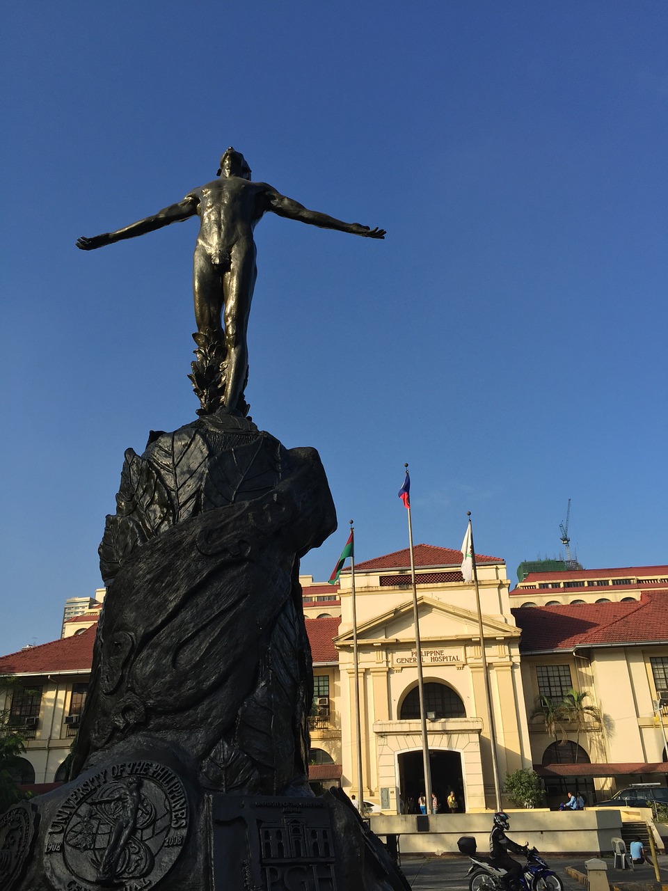 statue open arms university of the philippines free photo
