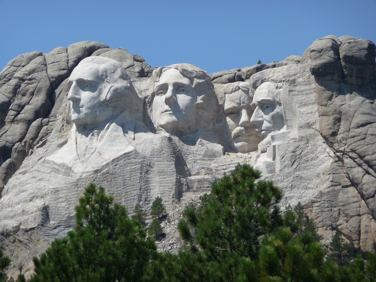 mountain rushmore stone carving free photo