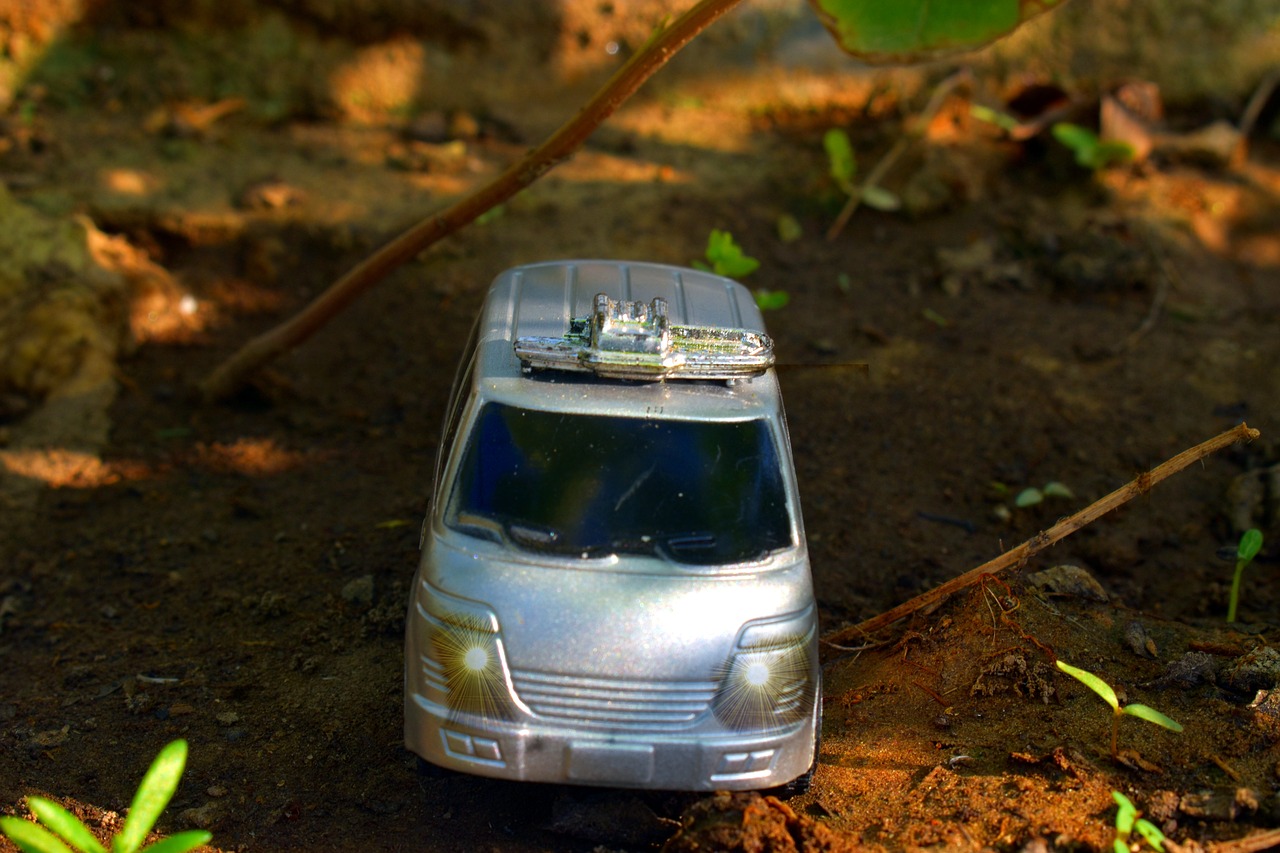 van toy in woods free photo