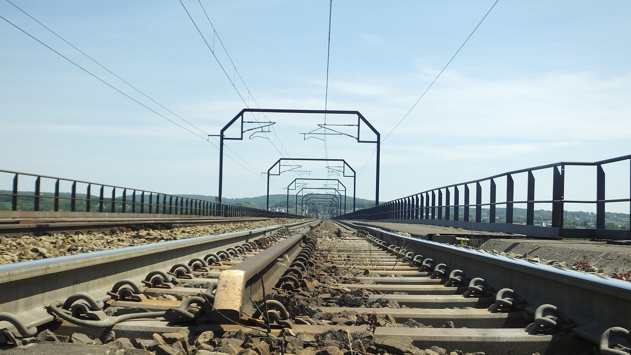 railroad tracks railway bridge seemed free photo