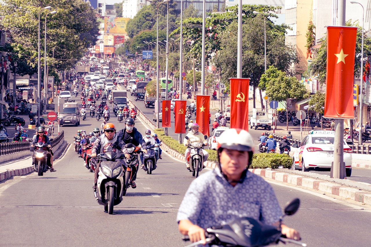 vietnam  scooter driver  motor bike free photo