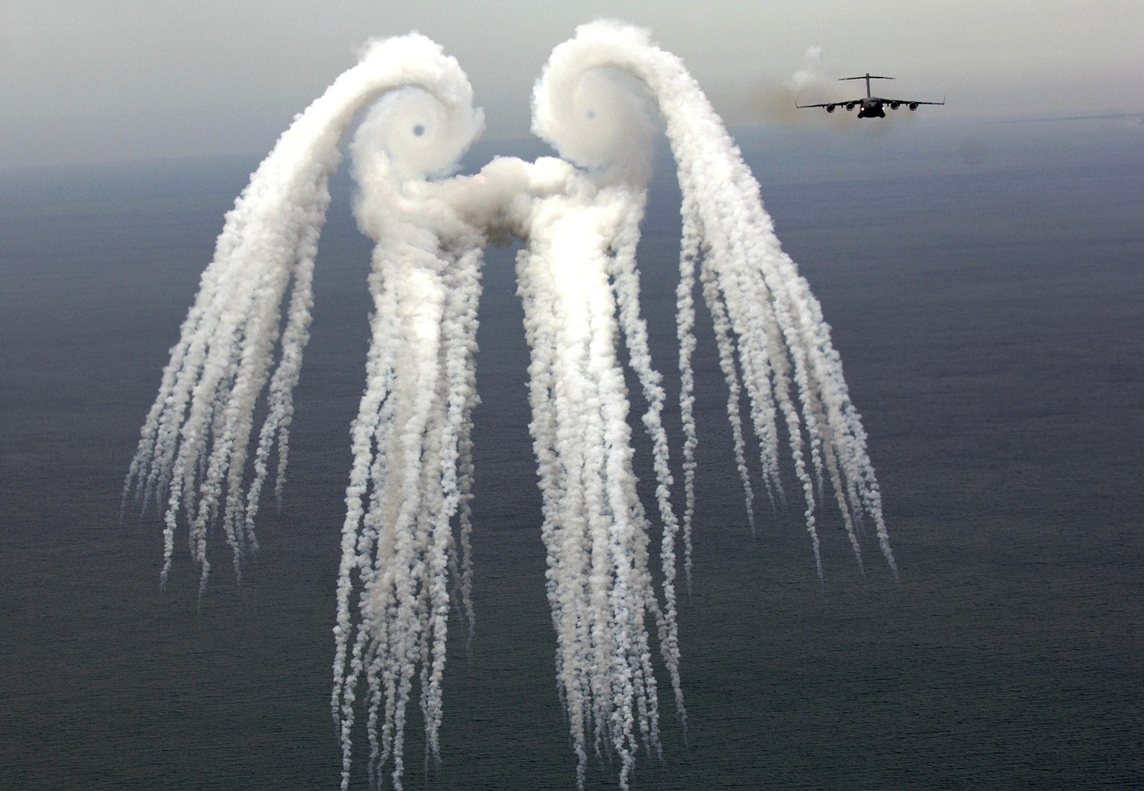 vortex airplane flares released free photo