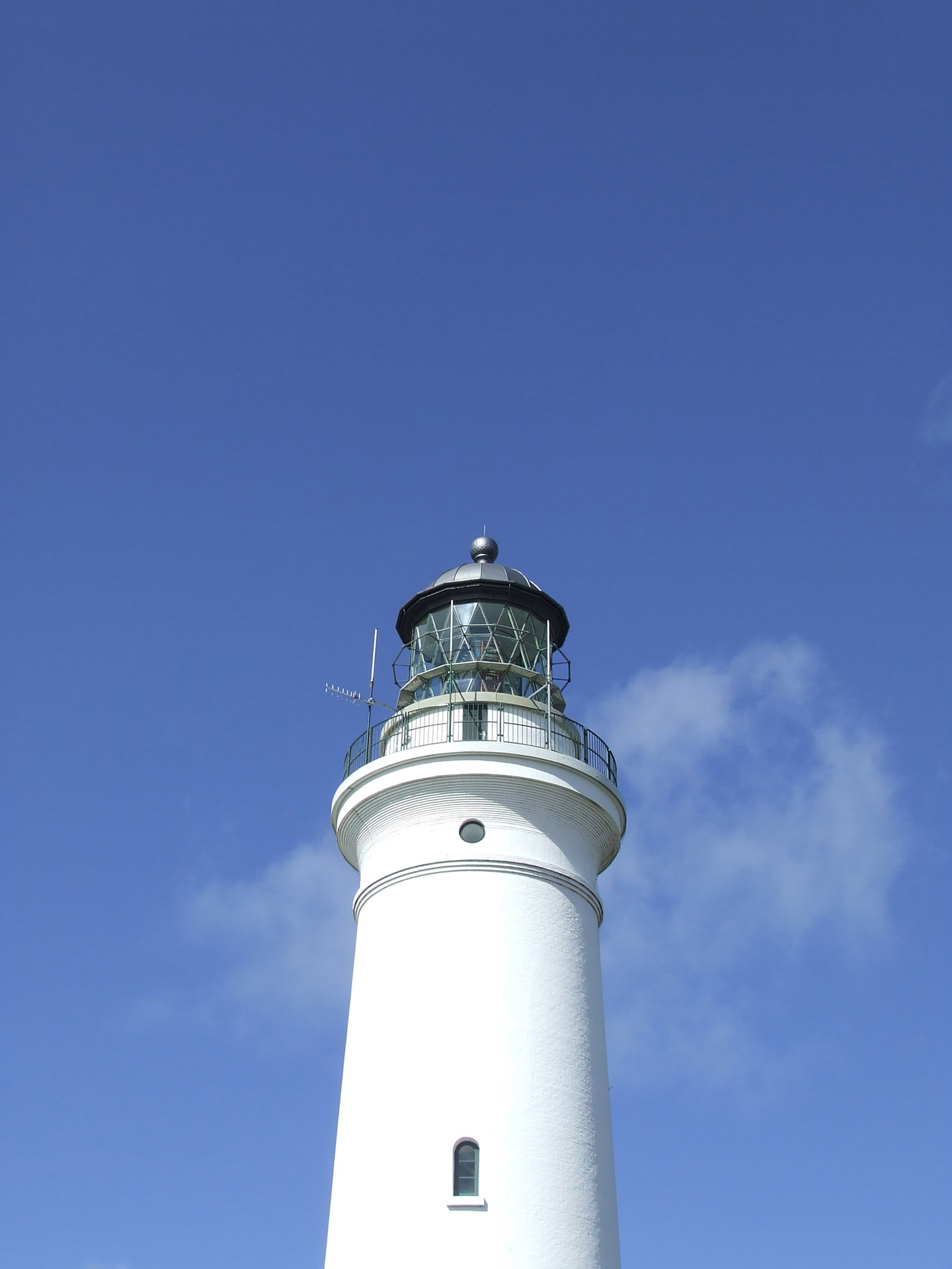 lighthouse blue blue sky free photo