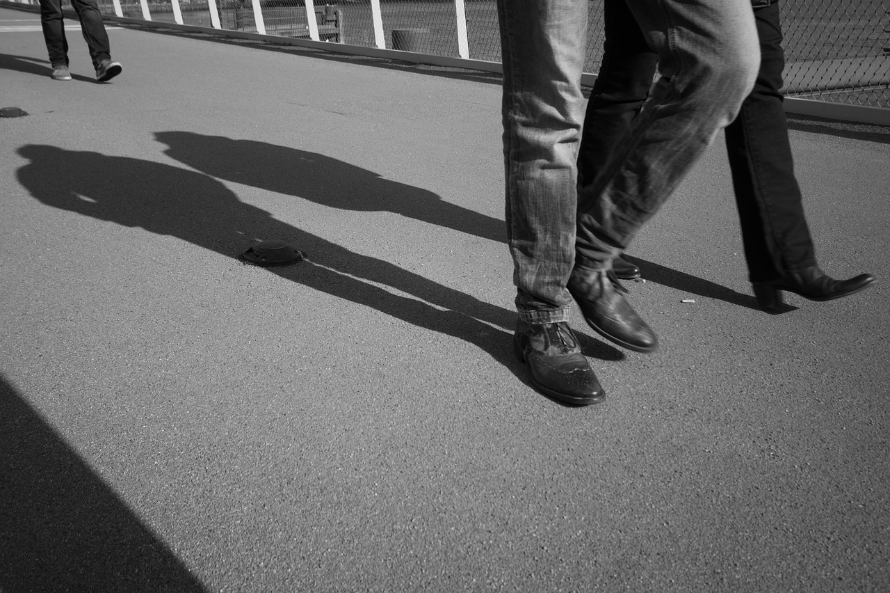walking shadows business free photo