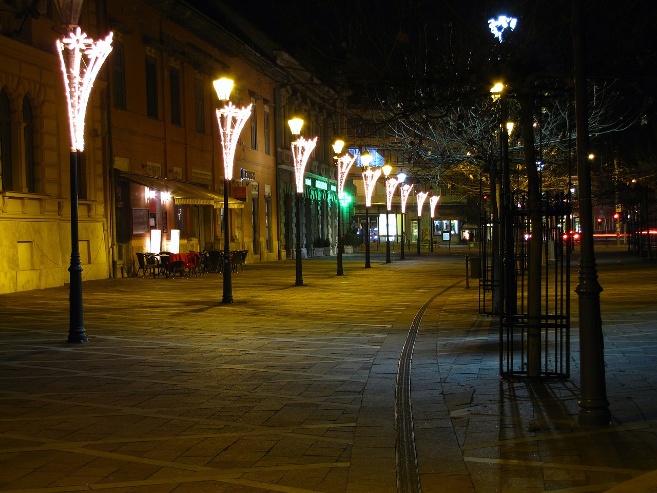 walking street lamps in the evening free photo
