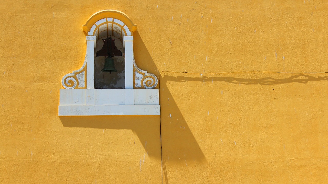 wall bell yellow free photo