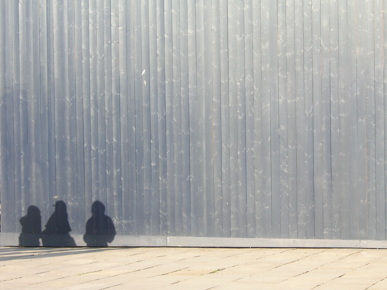 wall boards shadow human free photo