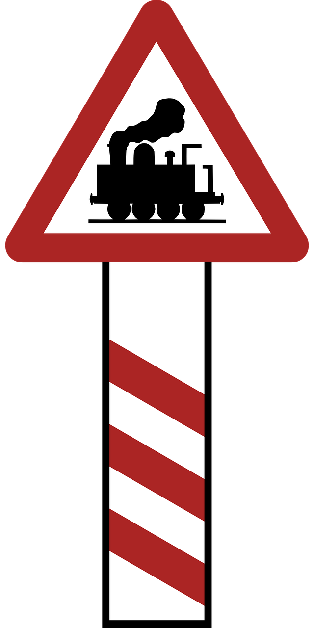 warning railway crossing road sign free photo