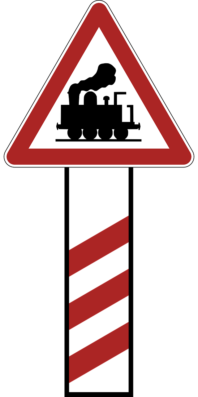warning railway crossing road sign free photo