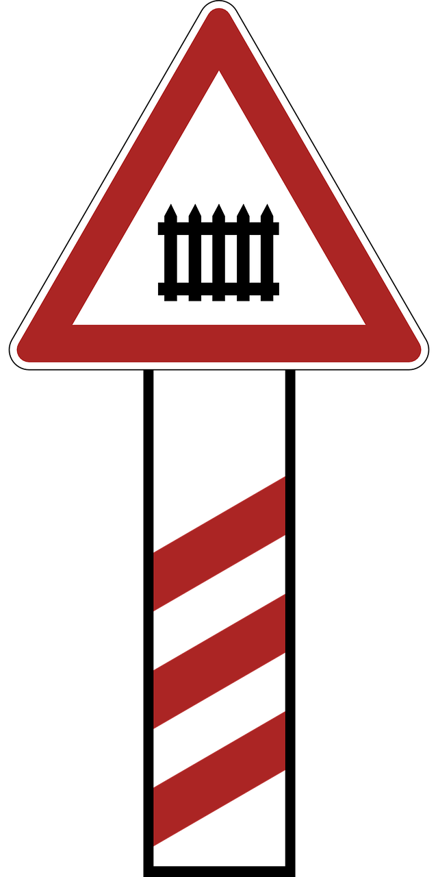 warning railway crossing road sign free photo