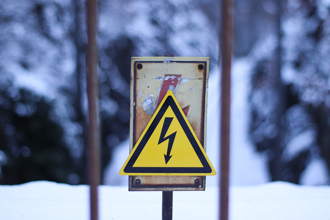 warnschild  street sign  high voltage free photo