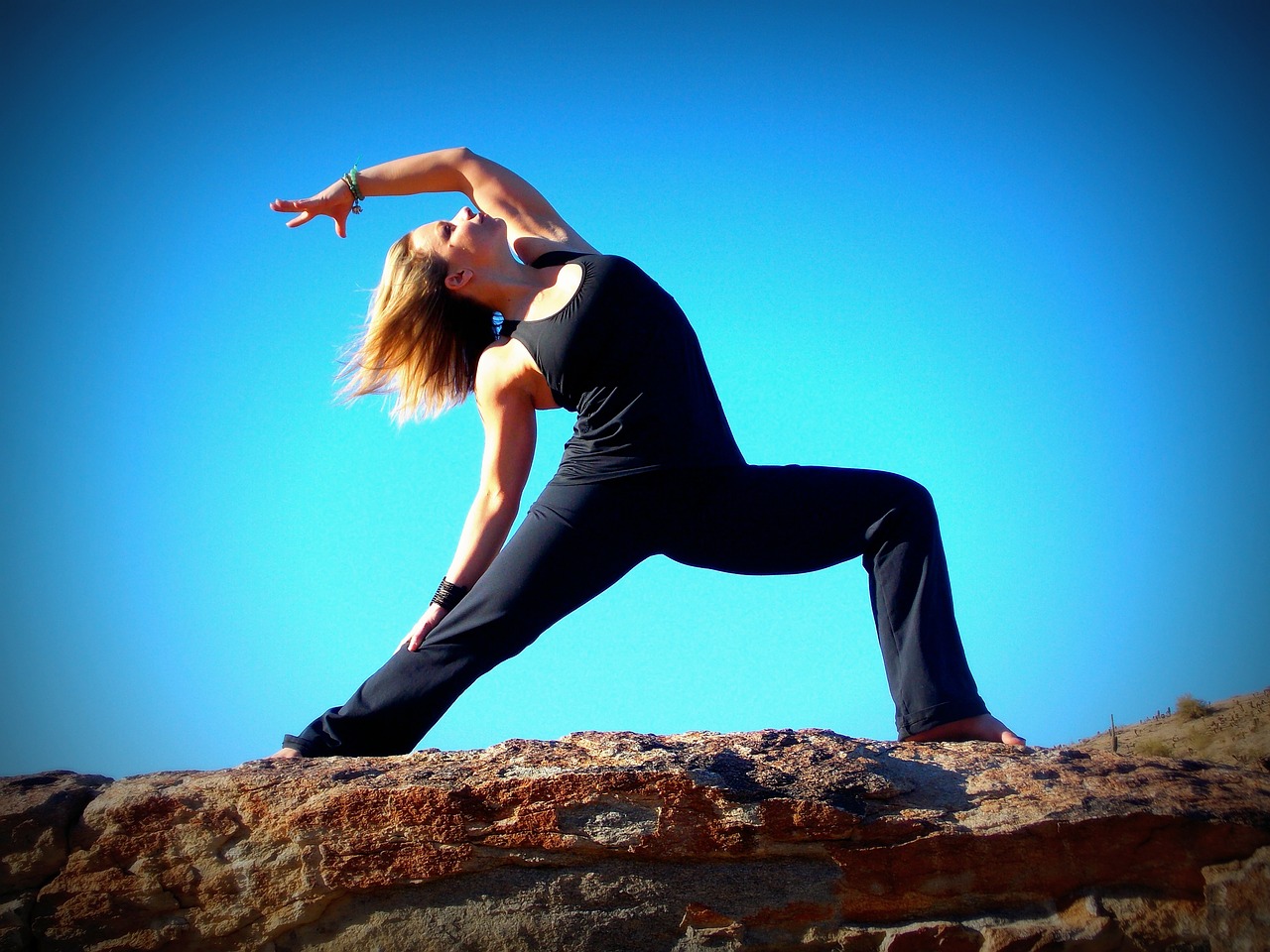 Warrior pose,yoga,rocks,blue sky,nature - free image from needpix.com