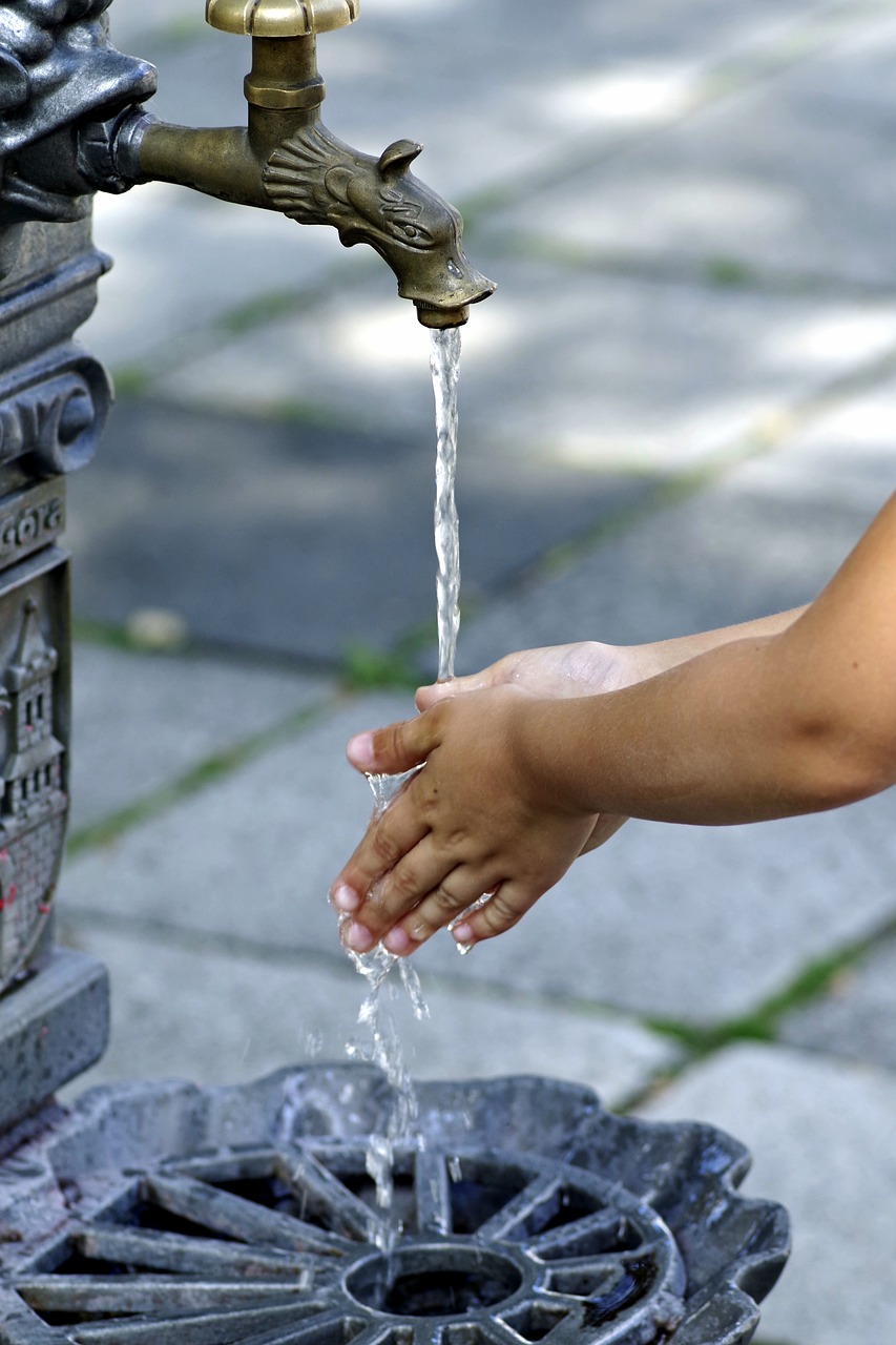 wash hands the purity of the water free photo