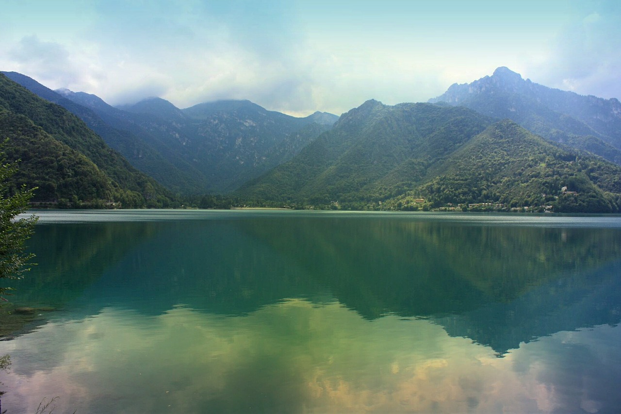 water mirroring mountains free photo