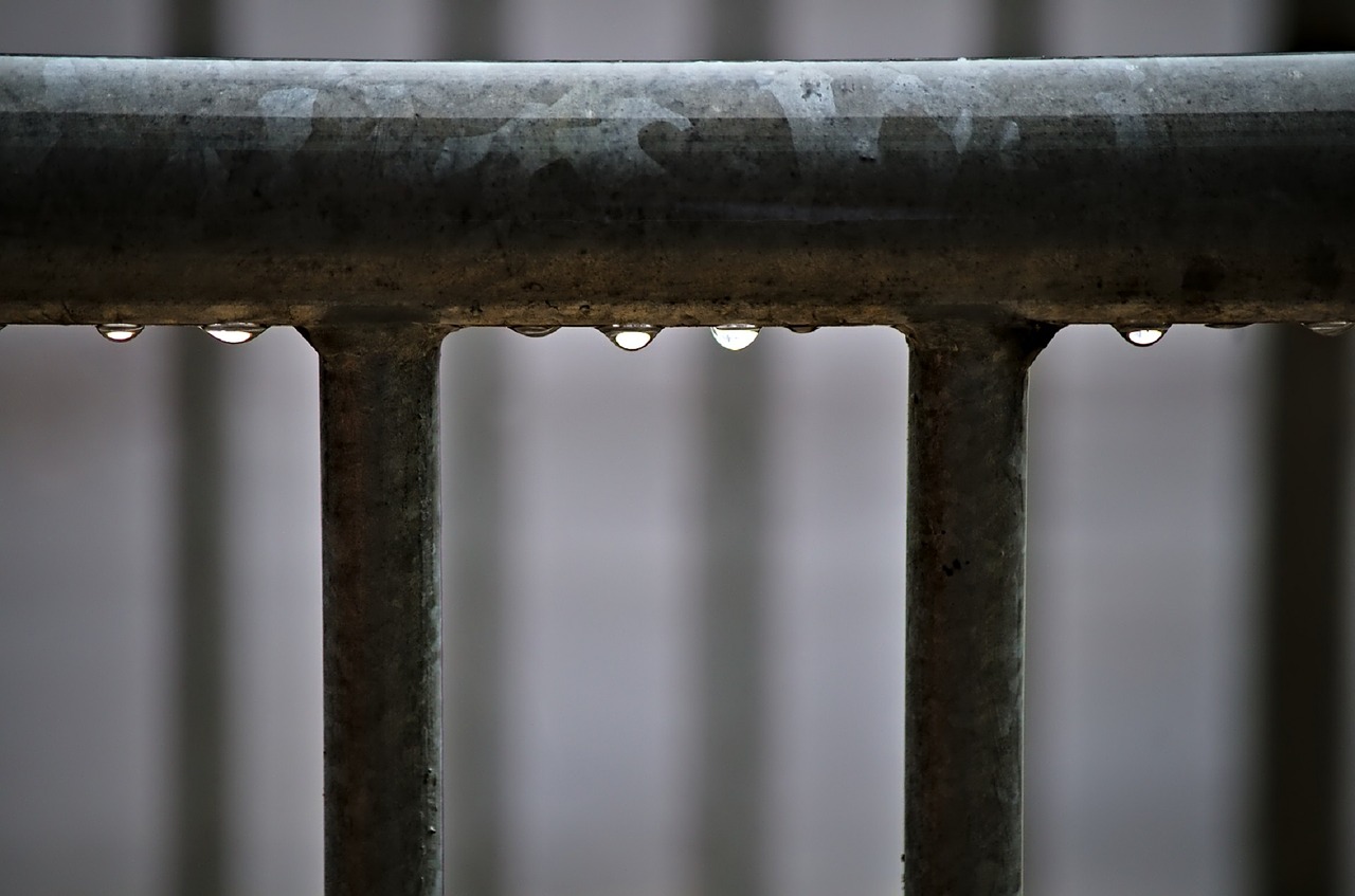 water droplets railing metal free photo