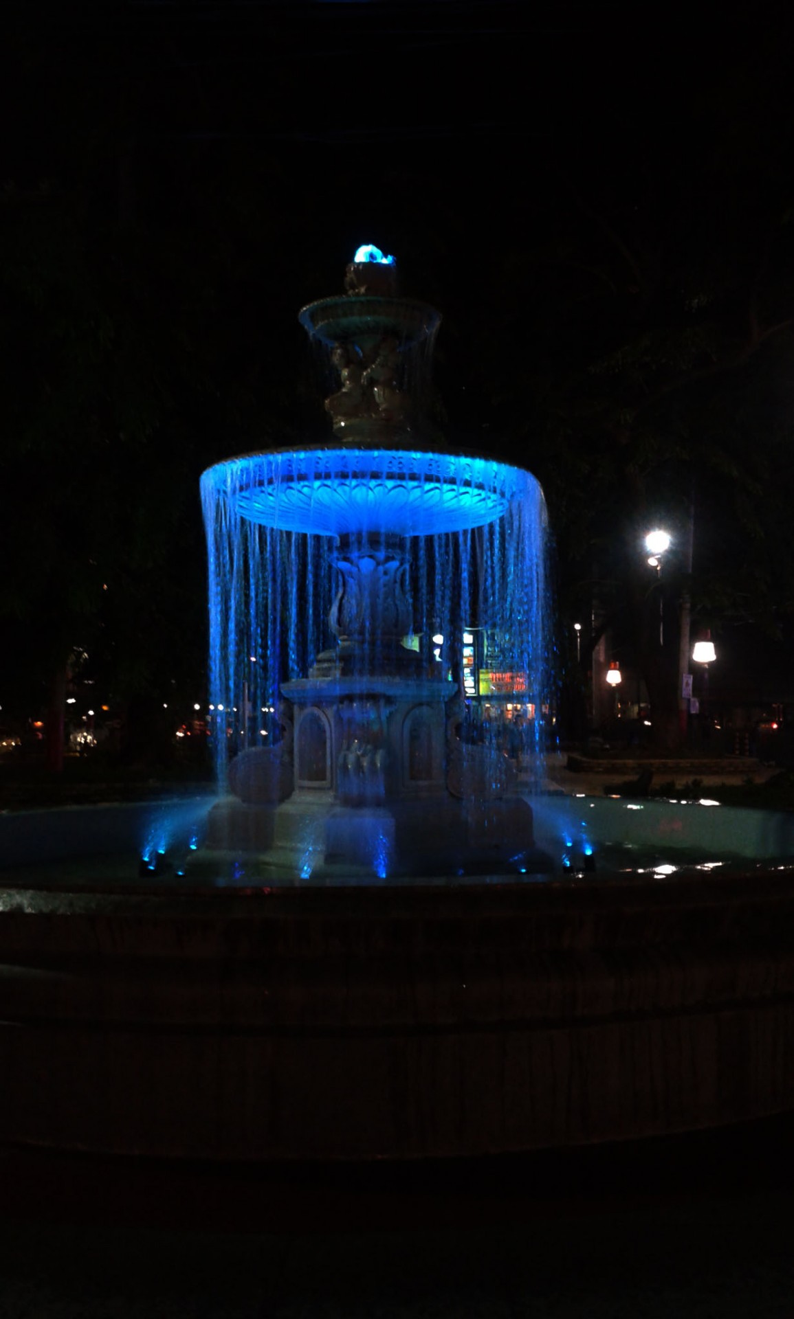 water fountain blue water fountain night free photo