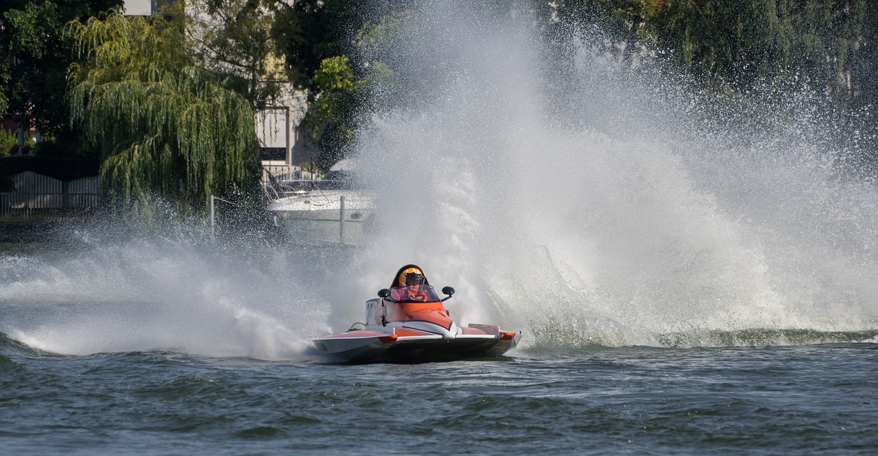 water sports  motor boat race  racing free photo