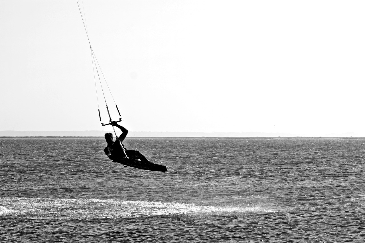water sports  black and white photography  greyscale free photo