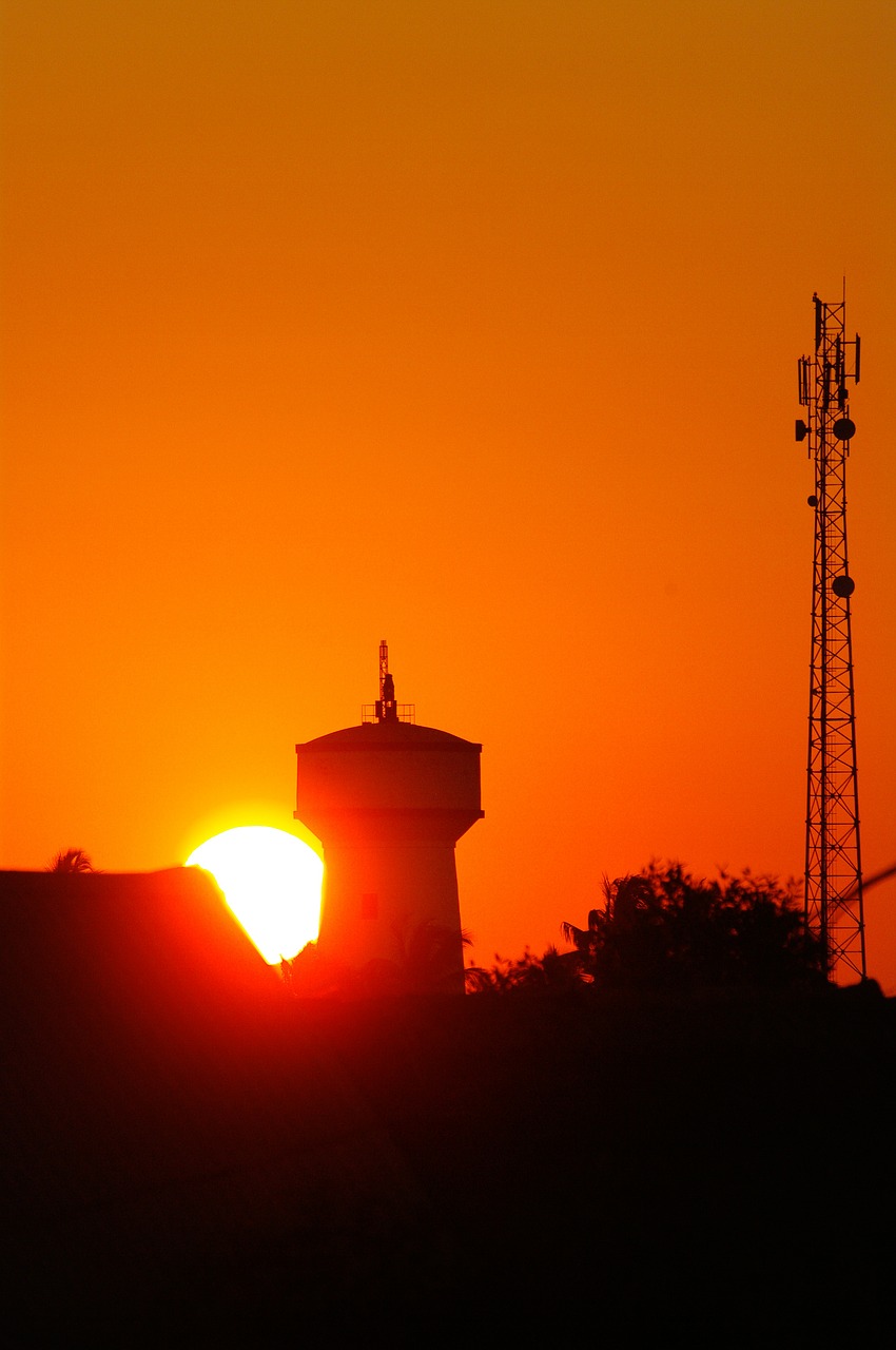 water tower radio tower sunset free photo