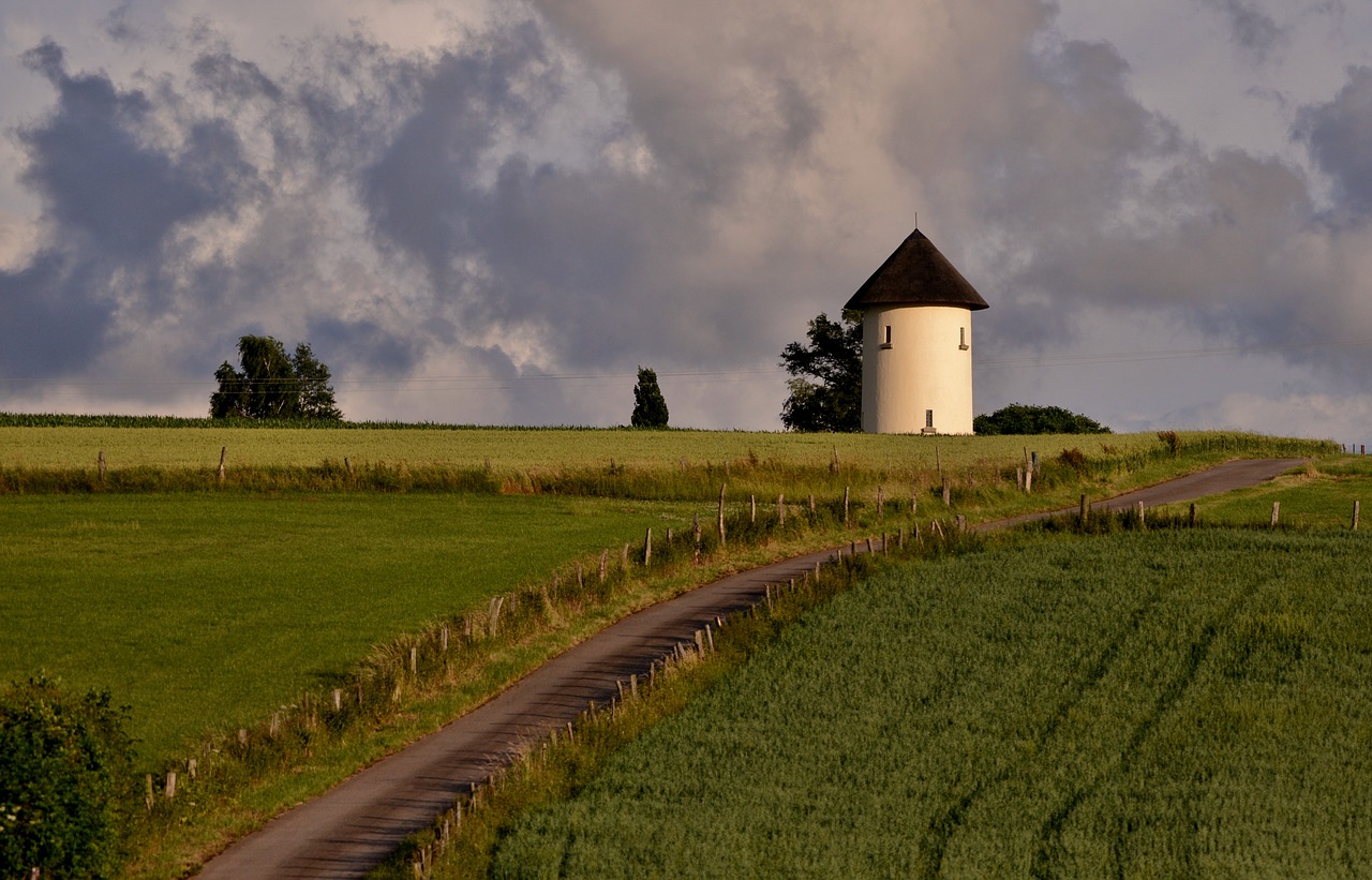 water tower  hilly  green free photo