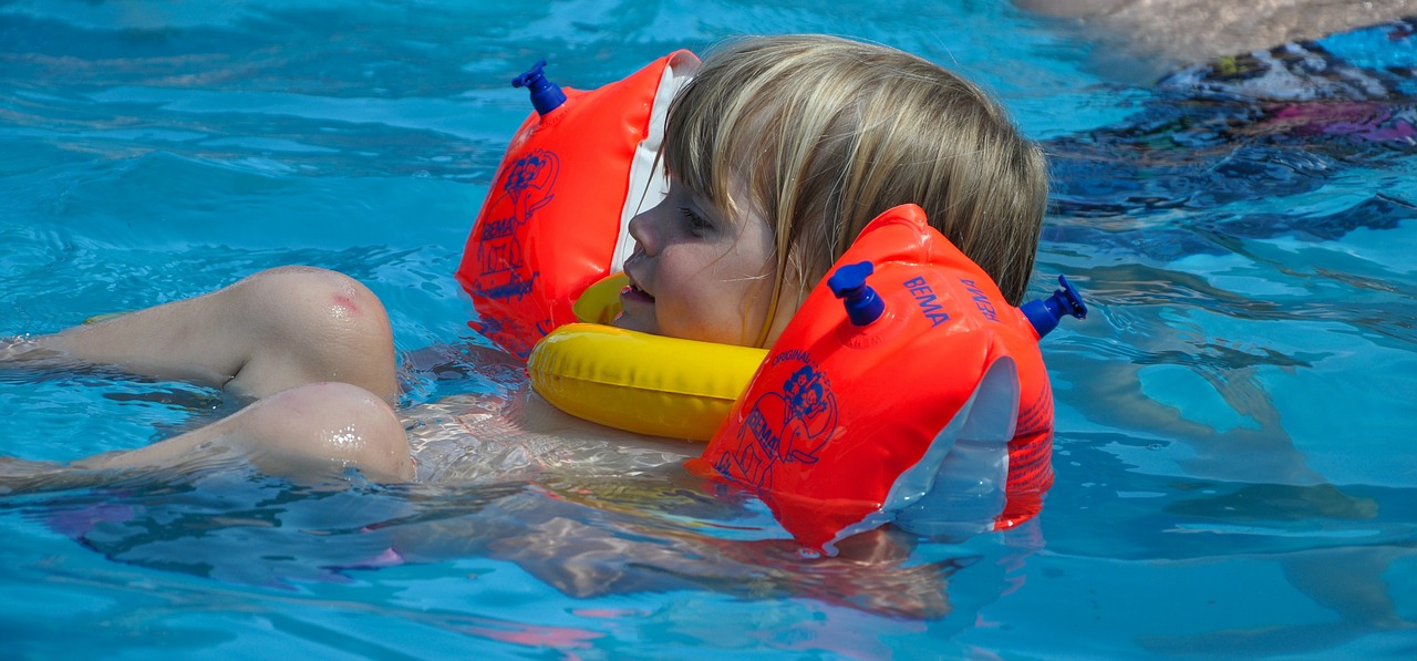 water wings human child free photo