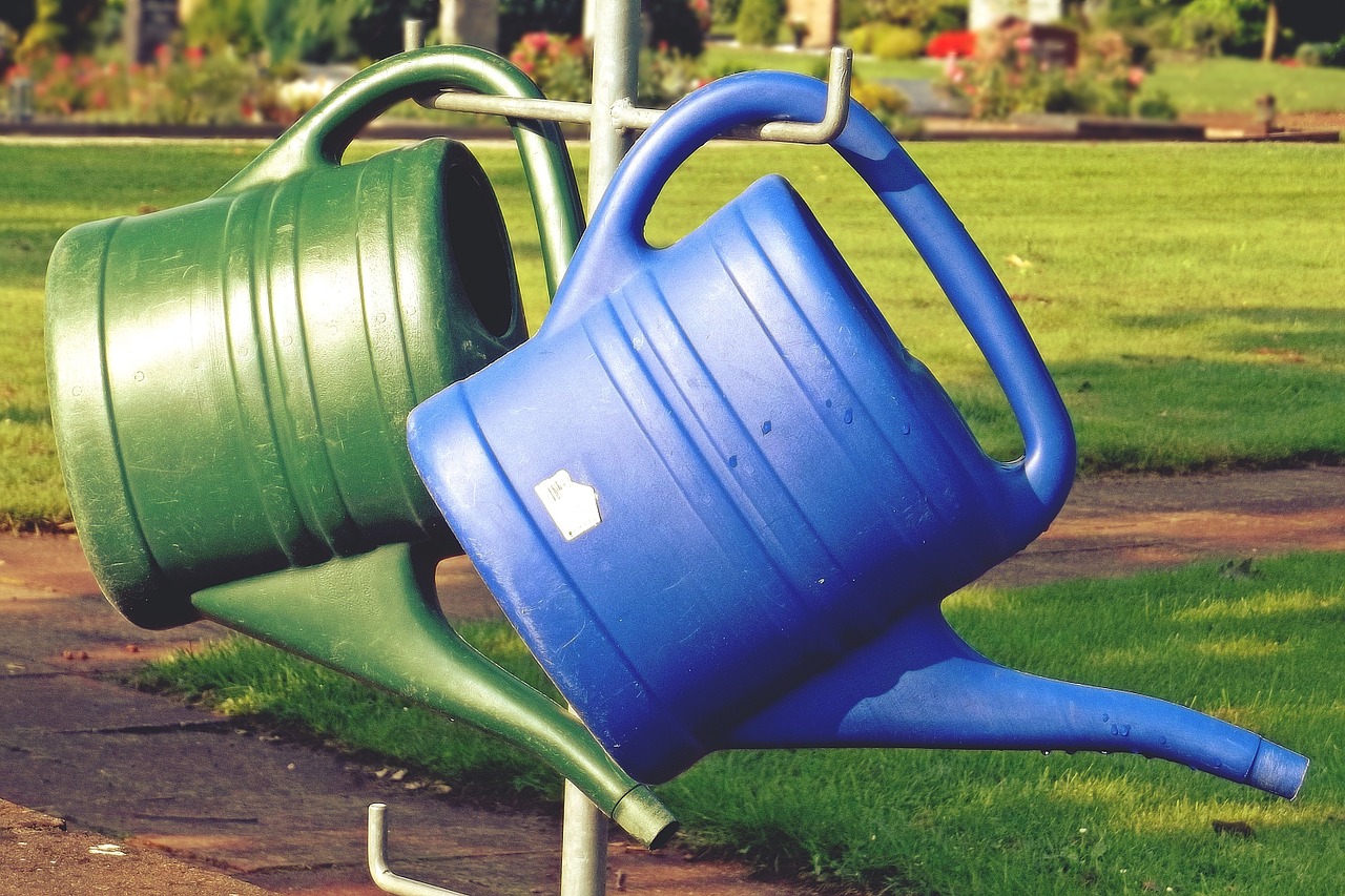 watering can casting cemetery free photo