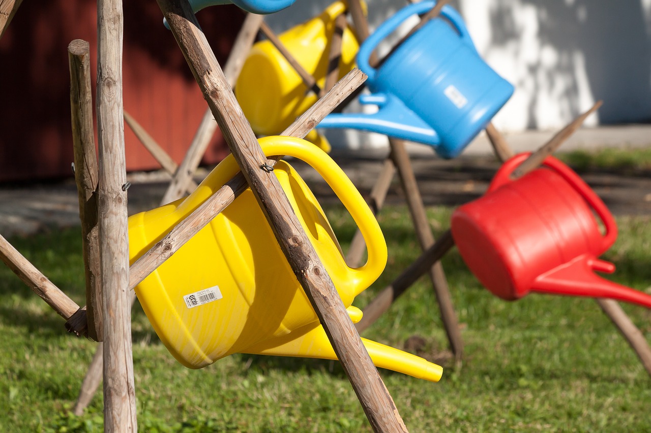 watering can plastic colorful free photo