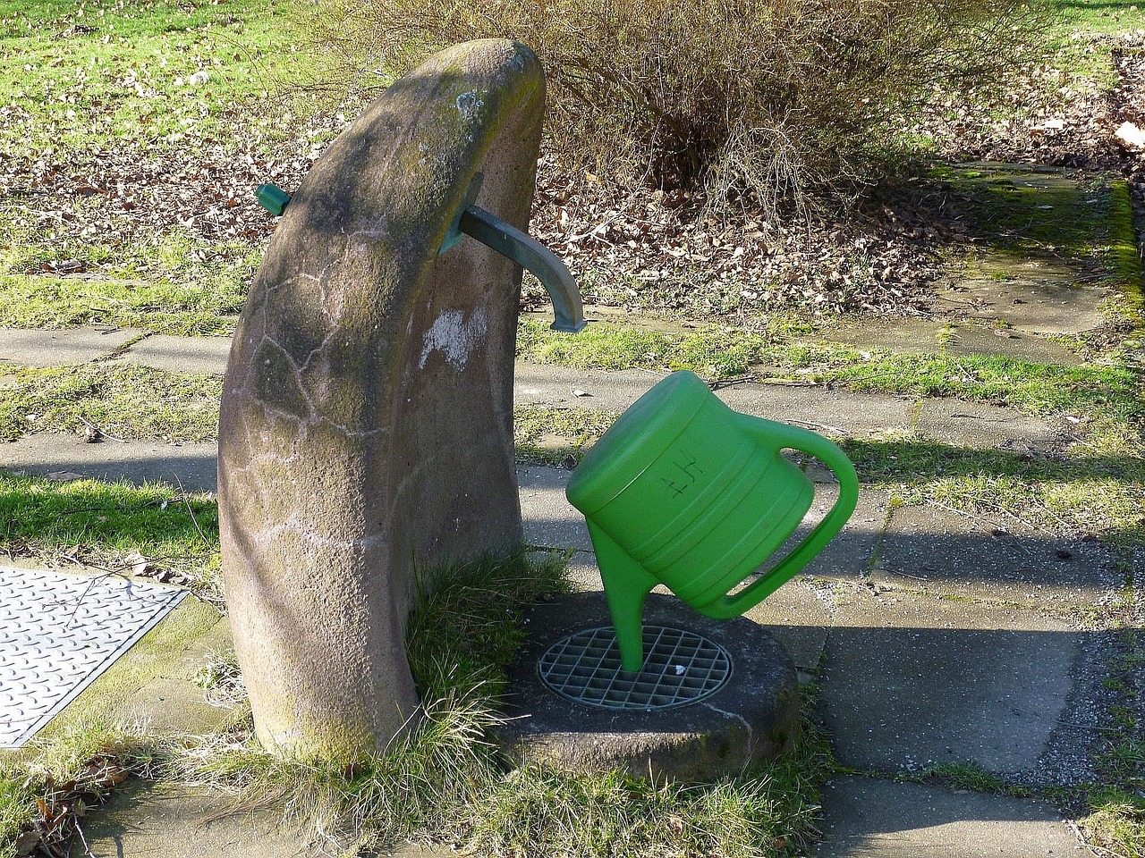 watering can fountain cemetery free photo