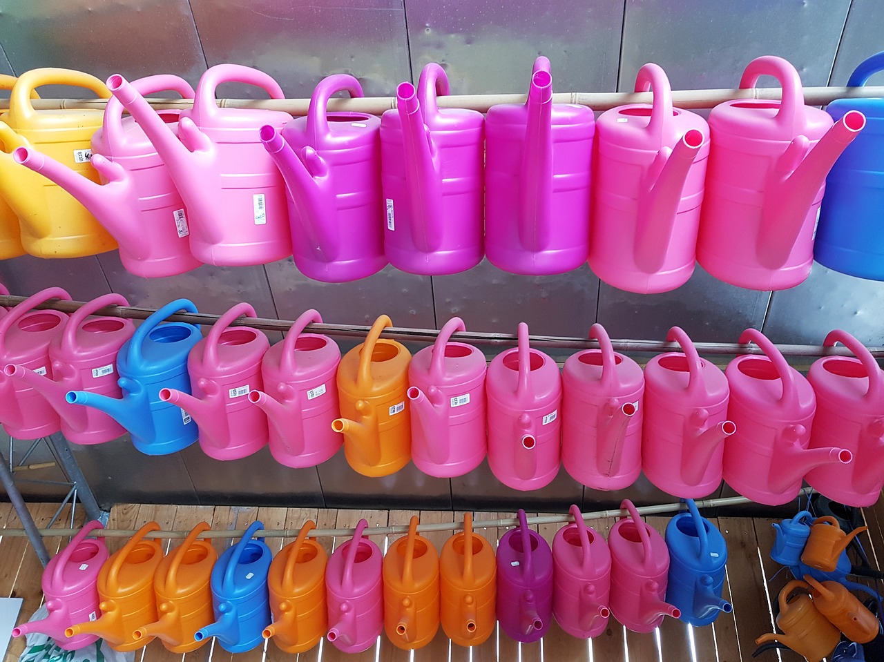 watering cans sale lined up free photo