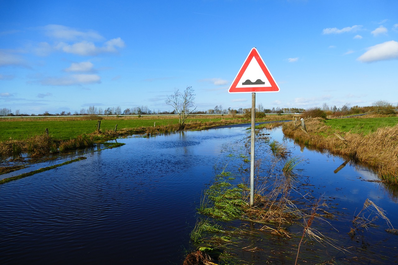 waterway flood road sign free photo