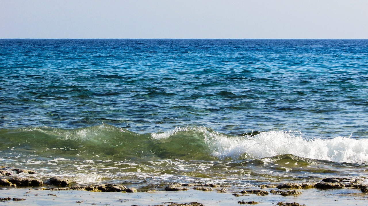 wave rocky beach sea free photo