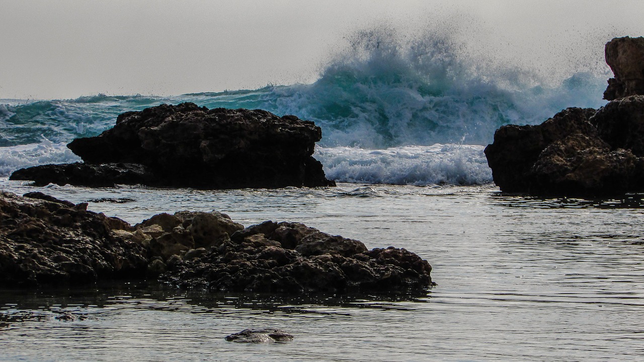 wave rocks smashing free photo