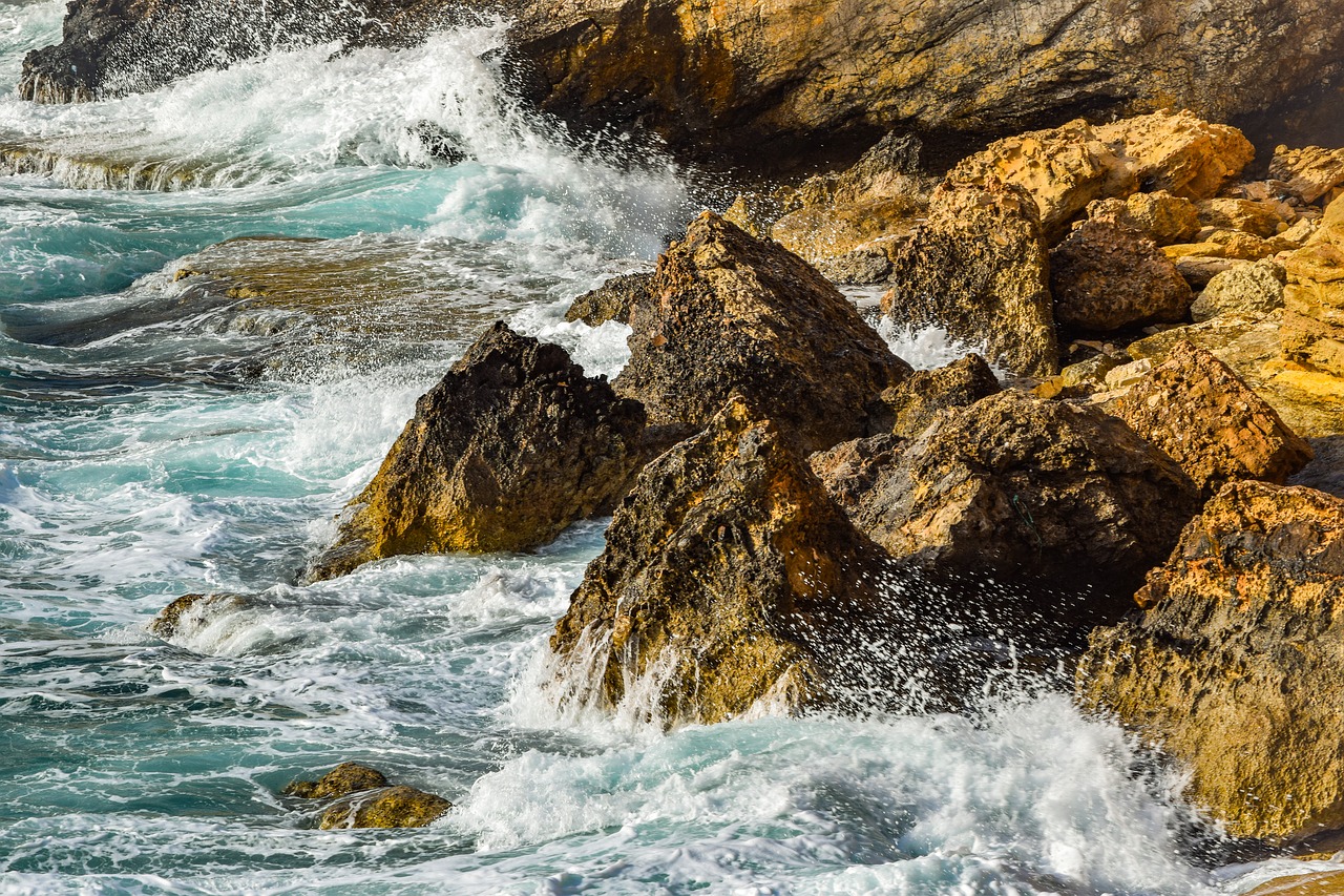 wave  crushing  rocky coast free photo