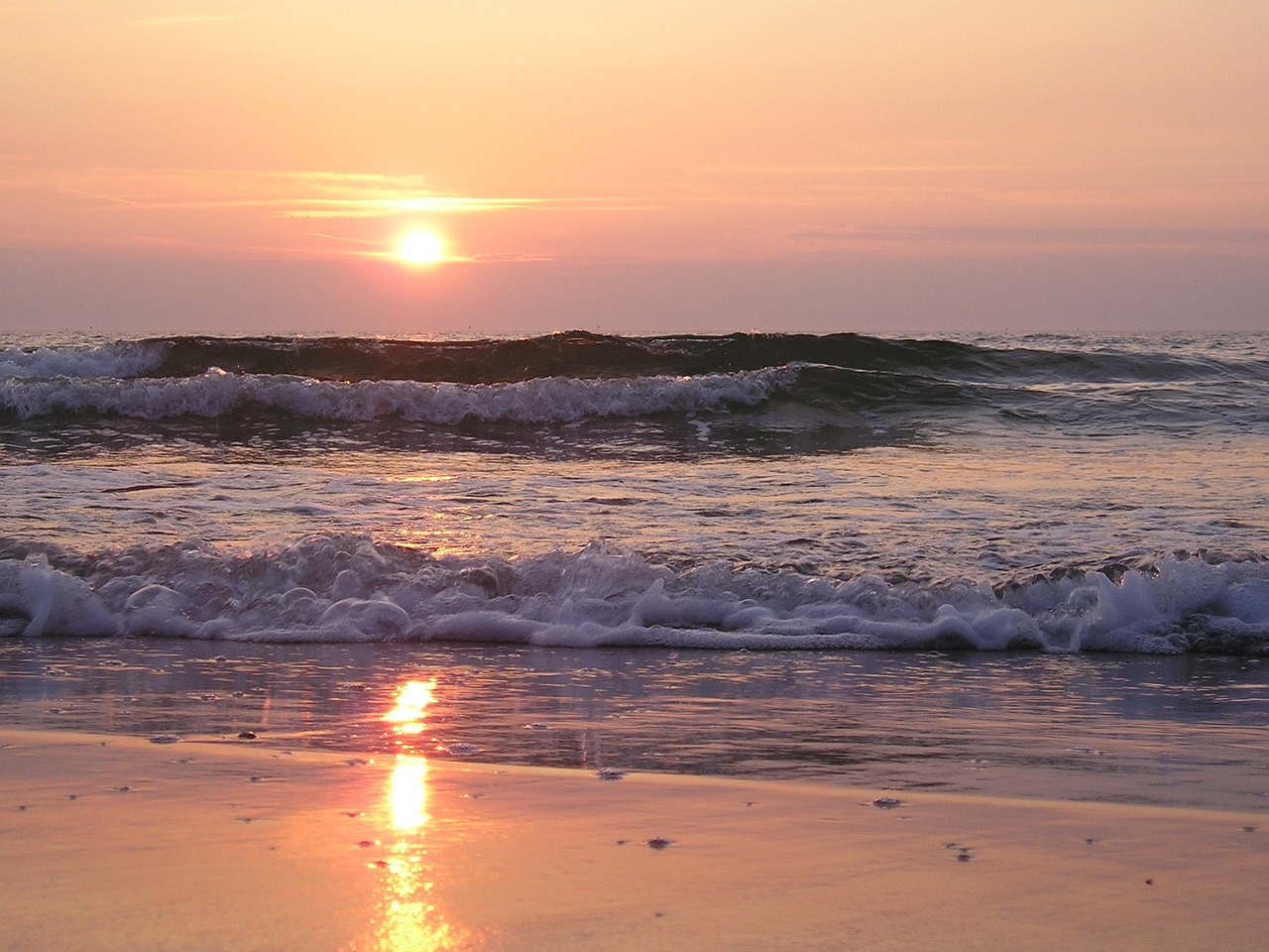 wave sunset baltic sea free photo