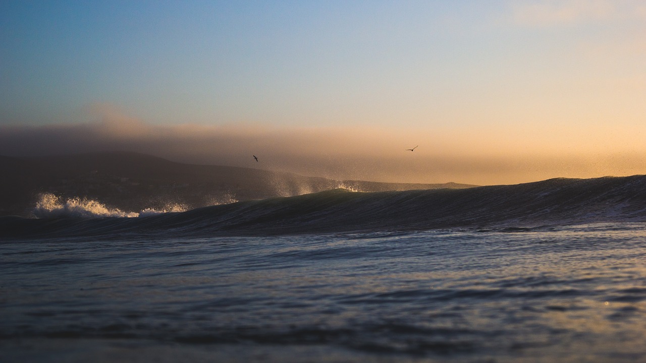 wave breaking breakwater free photo