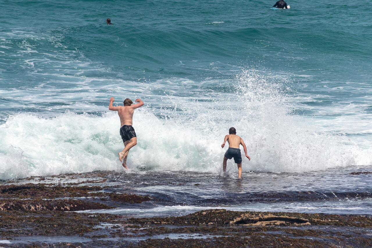 waves  boys  jumping free photo