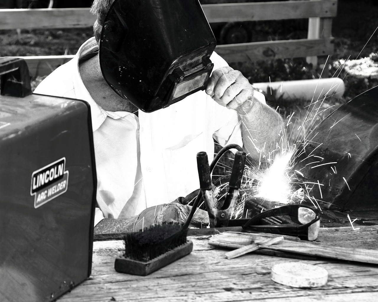 welder  welding  black and white free photo