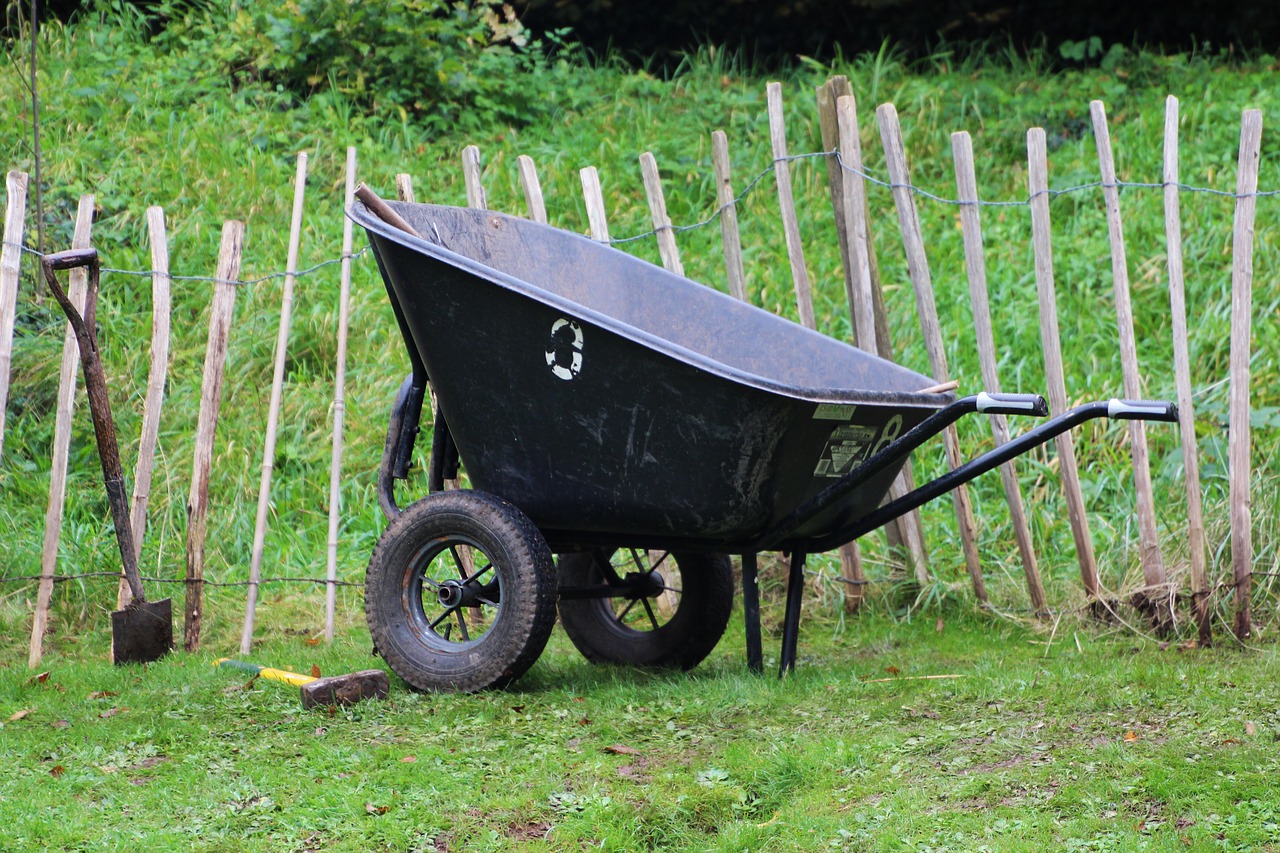 wheel barrow gardening garden free photo