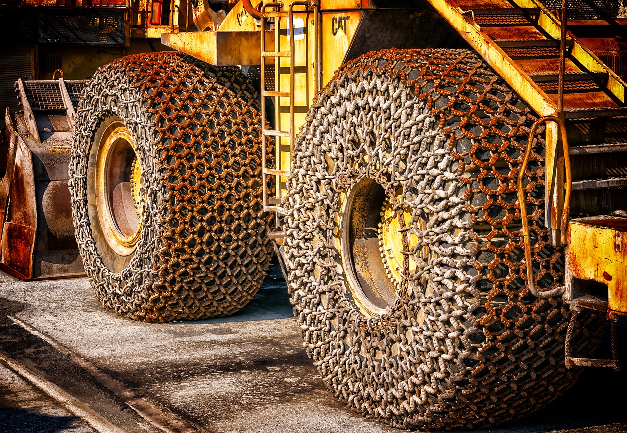 wheel loader wheels iron chain free photo