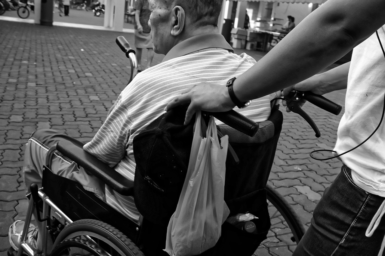 wheelchair elderly man free photo
