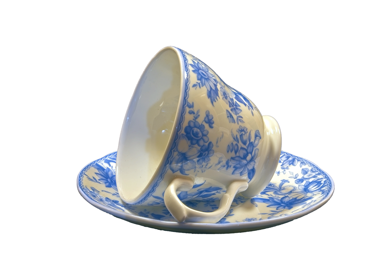 white and blue china  cup  saucer free photo