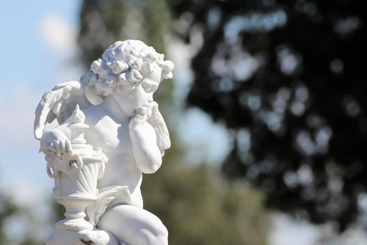 white angel  statue  sculpture free photo