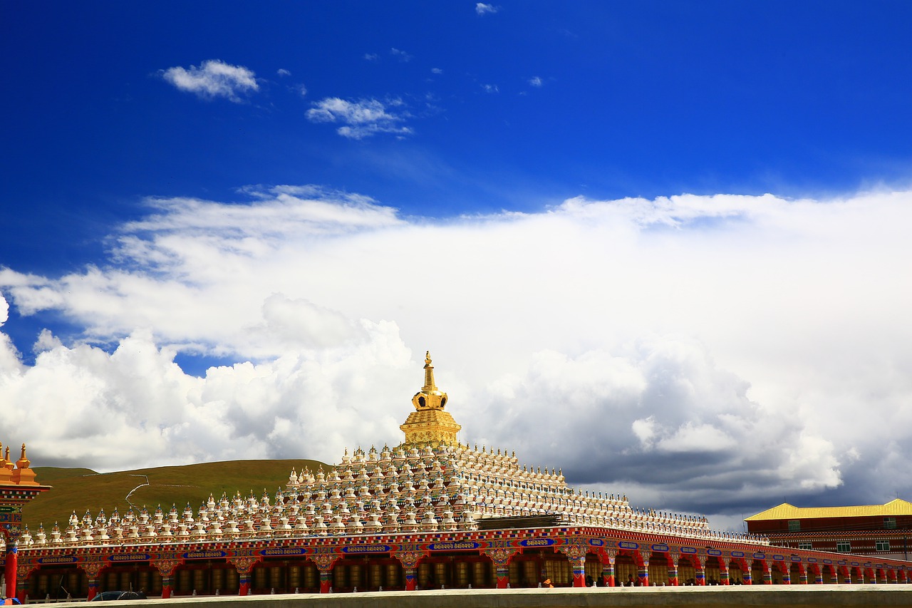 white cloud  by the tower  plateau free photo