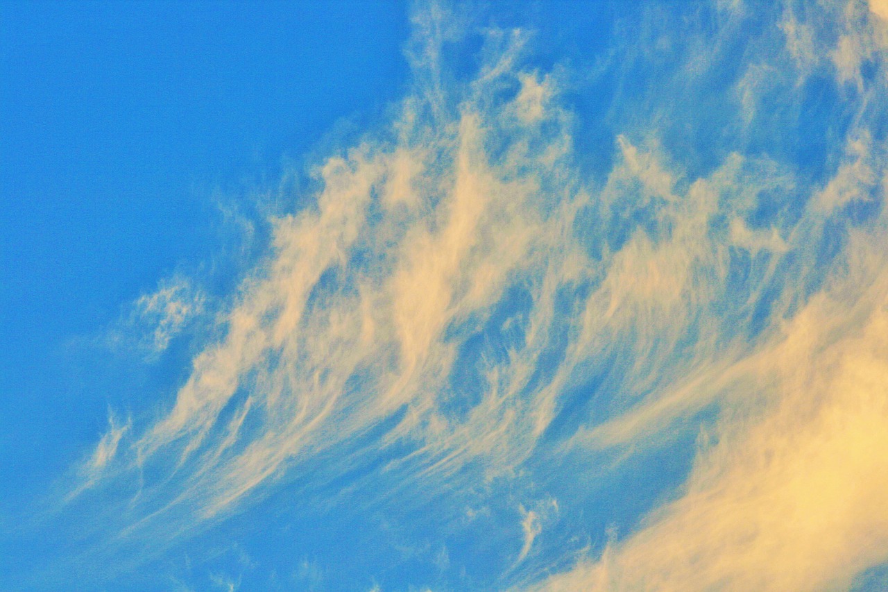 white clouds clouds wispy free photo