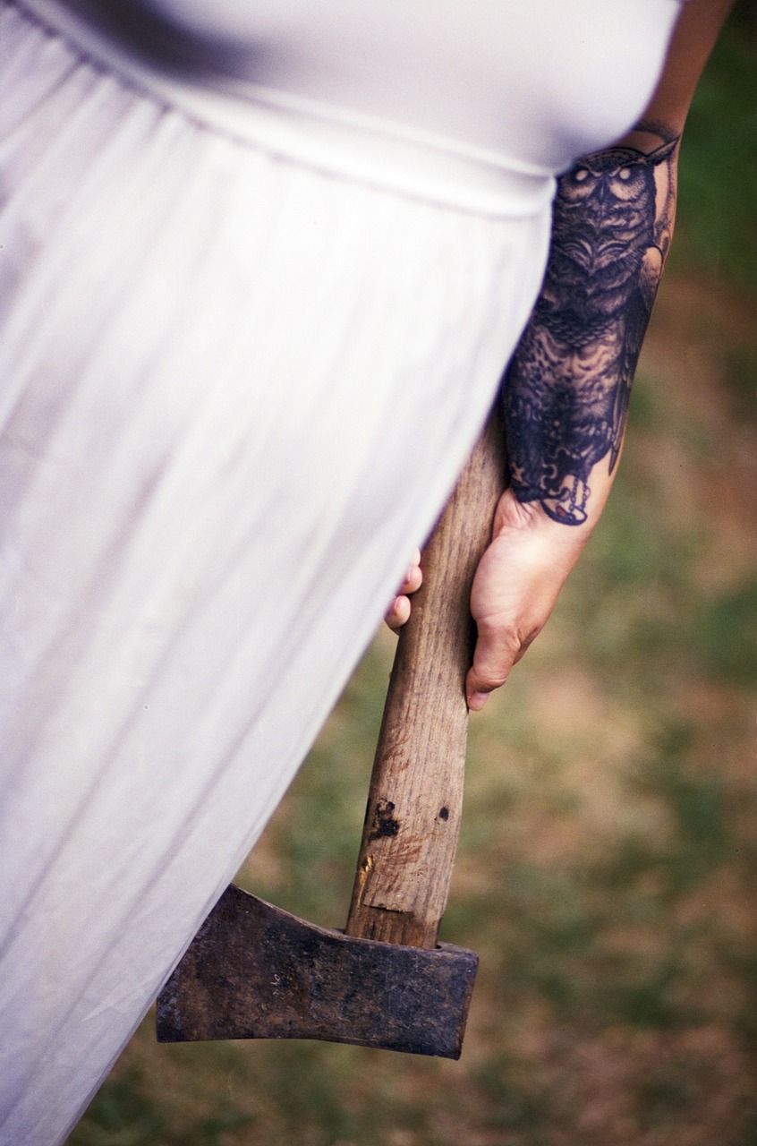 white dress axe tattoo free photo