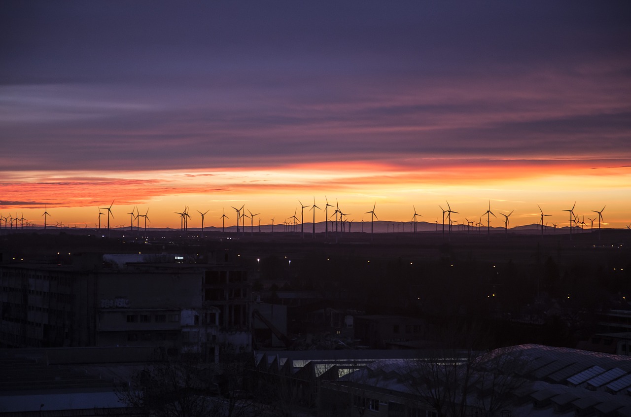 wind energy sunset wind mills free photo