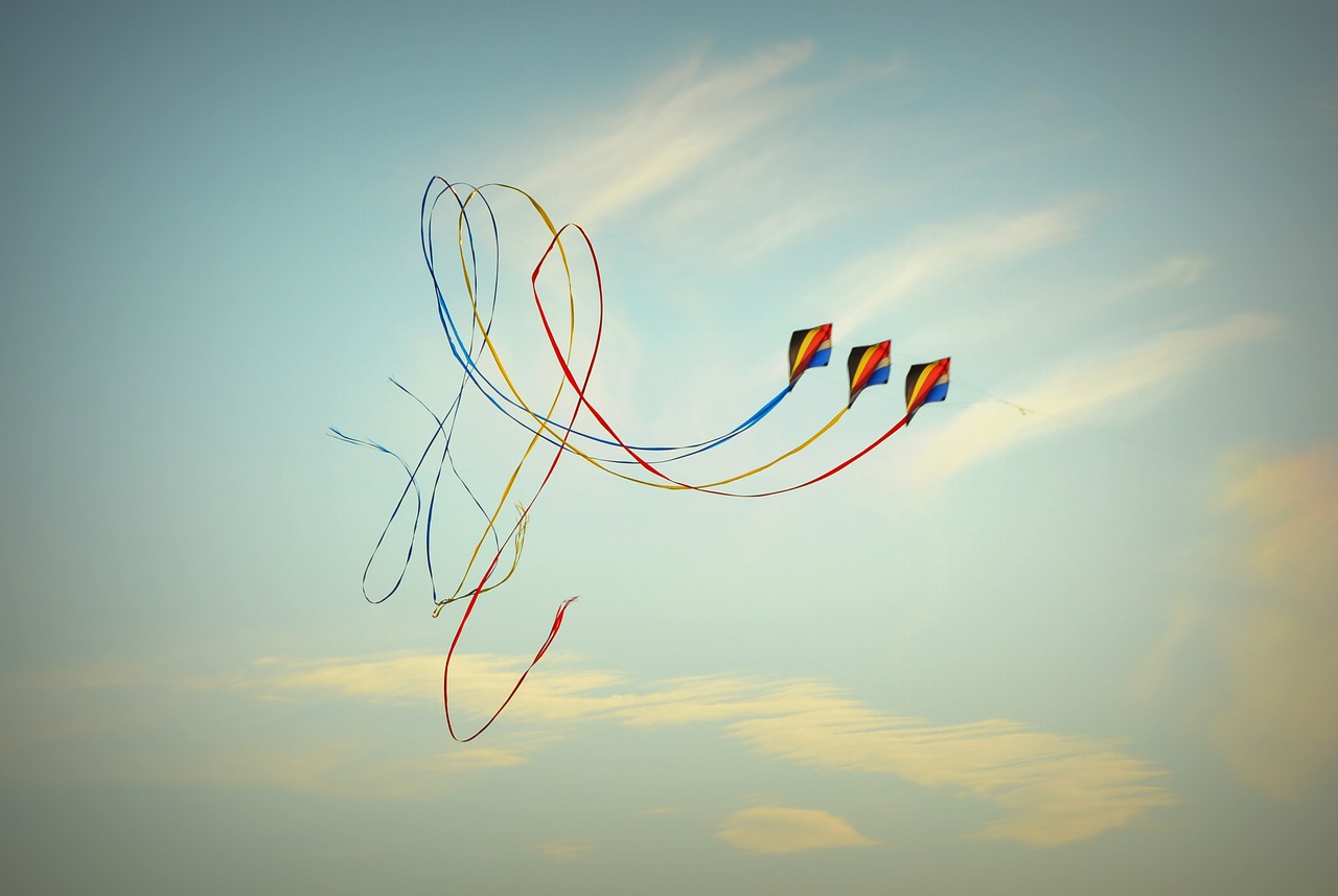 wind kite blue sky air free photo