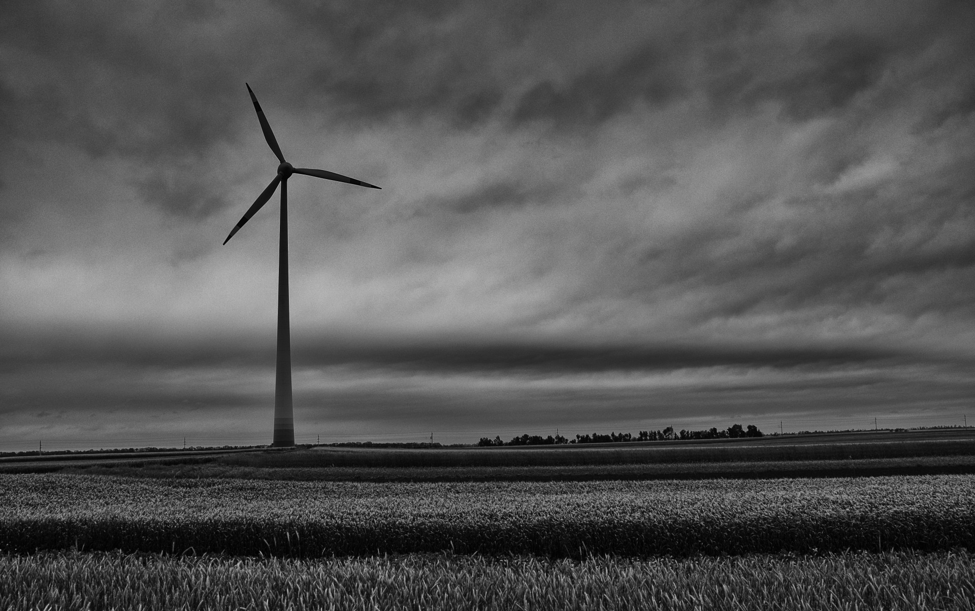 wind mill black white clouds free photo