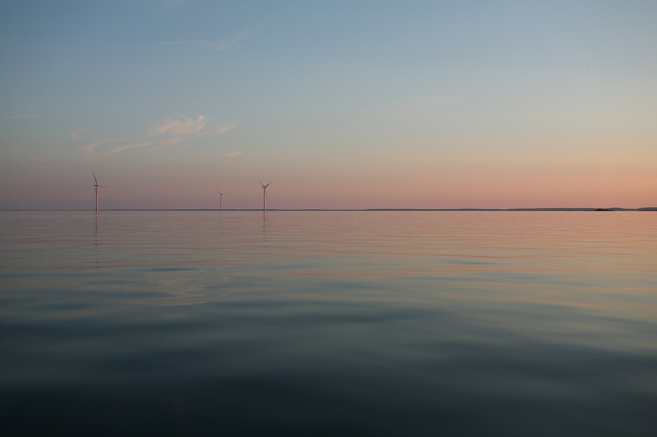 wind turbine evening lake free photo